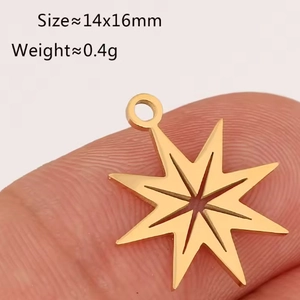 Close-up of golden stainless steel star pendant measuring 14x16mm for DIY jewelry making