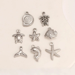 Detailed view of marine charms like starfish and sea turtle pendants for DIY jewelry