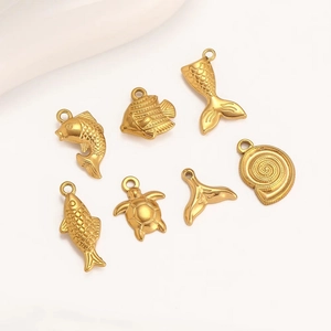 Golden stainless steel ocean pendants featuring sea turtle, starfish and seashell motifs