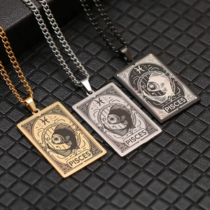 Detailed view of Pisces tarot necklaces in gold, silver and black stainless steel