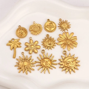 Collection de breloques dorées en acier avec tournesol palmier et papillon pour bijoux