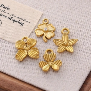 Pendentifs en acier inoxydable doré en forme de fleurs pour la création de bijoux