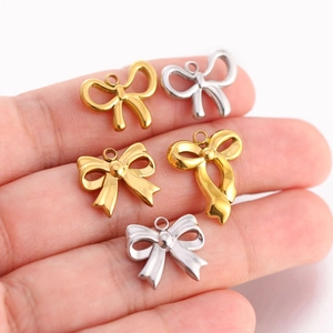 Pendentifs nœuds en acier inoxydable poli pour bijoux DIY en doré et argenté