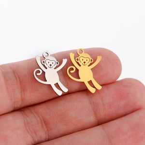Polished stainless steel monkey charms in gold and silver finish for DIY jewelry