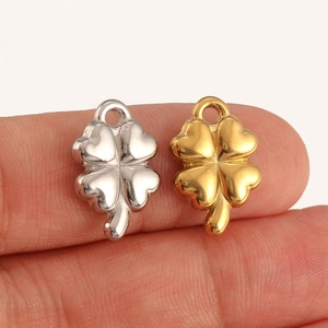 Polished stainless steel four-leaf clover heart pendants in gold and silver finish