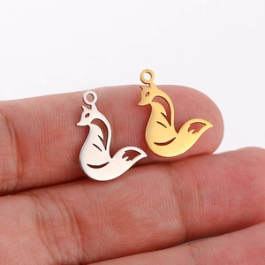 Minimalist fox silhouette charms in gold and silver mirror polished stainless steel