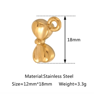 Polished stainless steel golden bow-knot pendant with metal ring attachment for jewelry