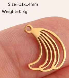 Macro shot of gold banana-shaped hollow pendant with detailed size and weight specs