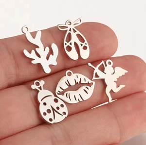Detailed set of five stainless steel charms including ballet shoes and Cupid for DIY jewelry