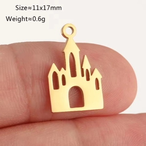 Detailed view of gold castle pendant charm with size scale 11x17mm for DIY jewelry