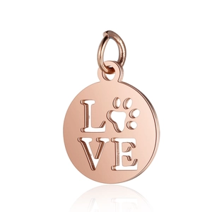 Macro detail of rose gold stainless steel pendant featuring hollow LOVE letters and paw print