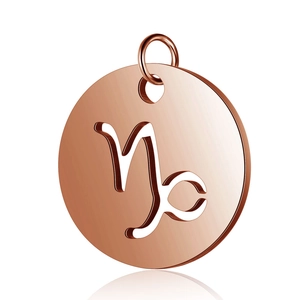 Macro view of rose gold 12mm Capricorn zodiac coin pendant with mirror finish