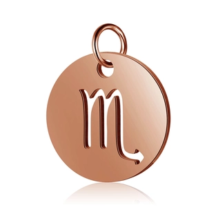 Macro shot of rose gold Scorpio zodiac sign pendant with hollowed circular metal design