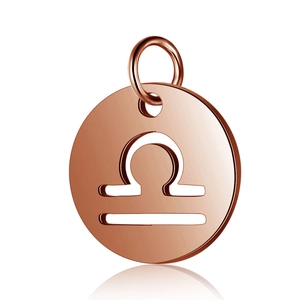 Detail of rose gold Libra zodiac pendant with brushed metal finish and cutout design