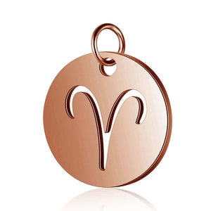 Macro view of rose gold Aries zodiac sign pendant with mirror polished finish