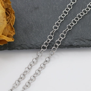 Macro view of silver stainless steel round link chain for DIY jewelry making