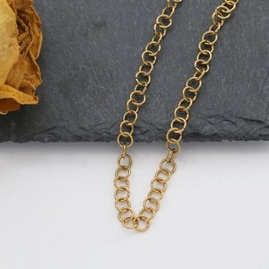 Detailed close-up of vacuum-plated gold stainless steel open rings for DIY jewelry making