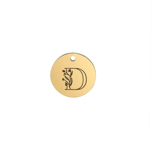 Detailed view of mirror polished 15mm gold stainless steel charm with floral letter D