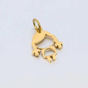 Macro view of polished gold stainless steel little girl pendant with hollow outlines