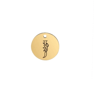 Close-up of a 15mm gold polished stainless steel pendant with engraved letter J and floral pattern