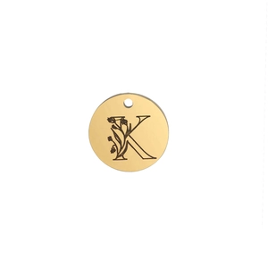 Detail showing 15mm mirror polished gold stainless steel pendant with letter K and lily floral