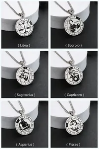 Detailed grid showing six zodiac coin pendants with etched astrological signs on O-chains