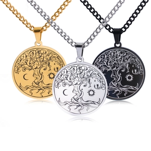 Three-piece Tree of Life sun and moon pendant necklaces in gold, silver, and black finishes