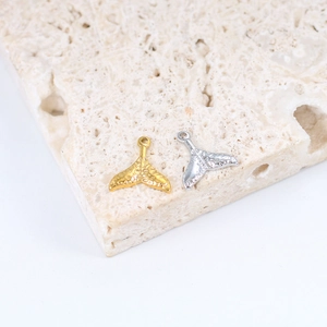Polished stainless steel mermaid tail charms in gold and silver finish for DIY jewelry