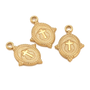 Detailed macro view of three gold-plated stainless steel oval cross pendants with sunray texture
