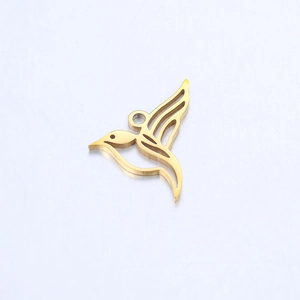 Detailed view of polished gold hummingbird hollow pendant made of stainless steel
