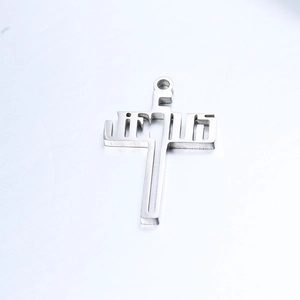 Polished stainless steel cross pendant featuring horizontal Jesus lettering and top ring