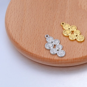 Geometric stainless steel circle pendants with embossed cultural motifs in gold and silver
