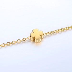 Minimalist gold stainless steel clover pendant bracelet with polished finish and O-chain link