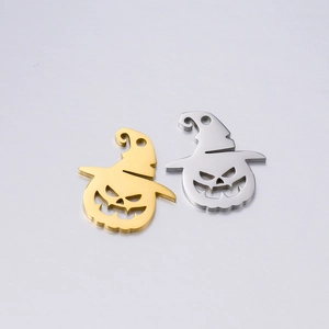 Close-up of gold and silver stainless steel pumpkin wizard hat pendants for DIY jewelry