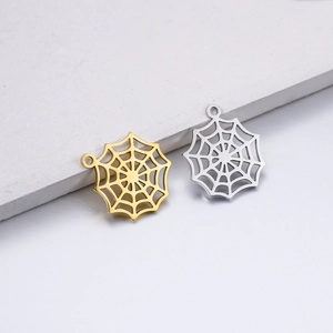 Detailed close-up of gold and silver stainless steel spider web pendants for DIY jewelry