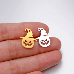 Hand holding gold and silver stainless steel Halloween pumpkin wizard hat pendants