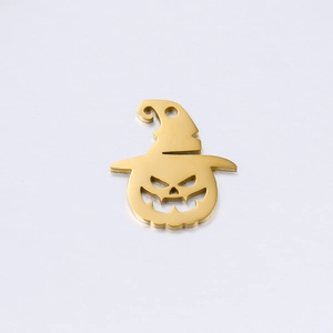 Detailed close-up of a gold hollow pumpkin with witch hat pendant for DIY jewelry making