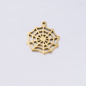 Close-up of golden stainless steel spider web charm with intricate hollow pattern