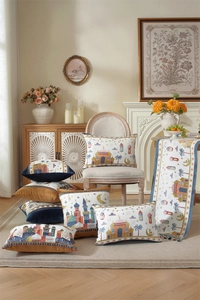 Detail of Middle Eastern moon and castle patterns on cushions and a matching table runner