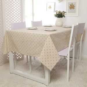 Linen style tablecloth with small floral pattern for a minimalist Nordic dining table