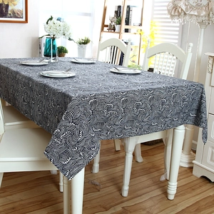 Detailed view of Japanese Zakka tablecloth featuring monochrome wave patterns and lace edges