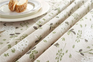 Detailed texture of white dandelion lace tablecloth with rural floral leaf patterns