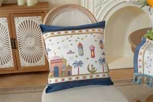 Detailed close-up of Ramadan Eid pillow with mosque moon stars and tassel fringe