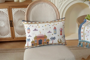 Detail of lumbar pillow case with Eid theme lanterns and palms on high-quality woven fabric