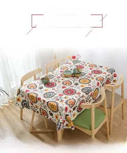 Close-up of ethnic sunflower pattern on thick cotton canvas tablecloth with mandala details