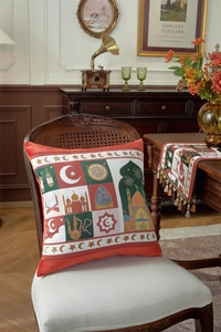 Detailed embroidery of Islamic mosque and crescent moon patterns on a festive table runner