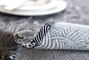 Close-up of Japanese wave pattern table runner with premium hemmed edge and thick texture