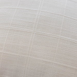 Macro view of solid color jacquard weave texture on minimalist polyester pillow cover