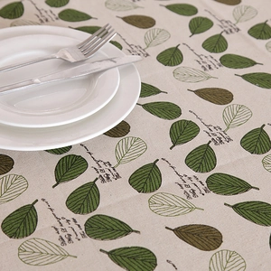 Detail of leaf pattern and fabric texture on a Nordic style polyester-cotton tablecloth