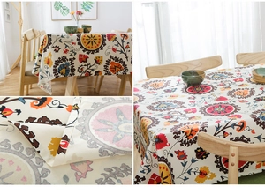 Detail of ethnic sunflower pattern on thick cotton canvas tablecloth with floral print